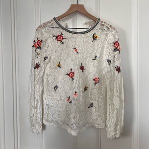 Lace top with embroidered flowers